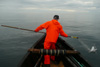 Finnbogi hevur fingið ein nátaunga í glúpin / Finnbogi har fået en mallemuk unge i nettet / Finnbogi caught a young fulmar with his net.