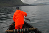 Finnbogi hevur fingið ein nátaunga í glúpin / Finnbogi har fået en mallemuk unge i nettet / Finnbogi caught a young fulmar with his net.