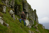 Jens-Kjeld við glúpi á veiðuferð í Lítlu Dímun / Jens-Kjeld Jensen på jagt efter insekter på Lítla Dímun / Jens-Kjeld Jensen catching insects in Lítla Dímun.