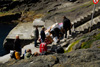 Vøruflutningur í Mykinesi / Transport af varer på Mykines / Transporting the luggage in Mykines.