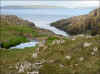 Hoyvík við Nólsoy í baksýni / Hoyvík med Nólsoy i baggrunden / Hoyvík with Nólsoy in the background.