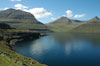 Elduvíksnes við bygdini Funningur í baksýnuni / Elduvíksnes med bygden Funningur i bagrunden / Elduvíksnes with the village Funningur in the hindmost.